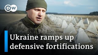 How Ukraine builds fortifications on its border with Russia and Belarus  DW News [upl. by Enaenaj]