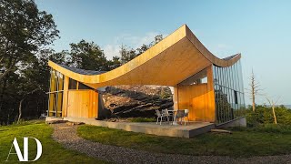 Inside a Family Home Built Around a 12000YearOld Boulder  Unique Spaces  Architectural Digest [upl. by Nyrb]