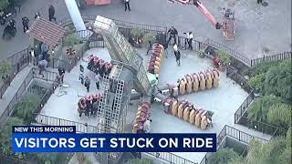 Riders stuck for over an hour on southern California amusement park ride [upl. by Fiorenza]