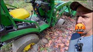 John Deere 1025R Im In Over My Axles With Mud Anybody have some Tire Black [upl. by Tierell]