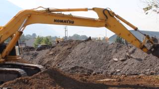 Komatsu PC 220 Excavator digging a huge pile of dirt [upl. by Kurland169]