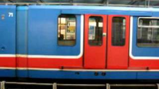 Classic DLR B92 Stock train at West India Quay Original livery [upl. by Katrine]