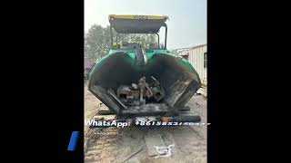 Secondhand 11yearold Vogele 18002 telescopic paver [upl. by Eilarol722]