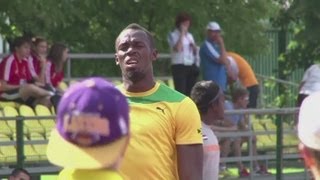 Usain Bolt and Jamaican track team train in Moscow [upl. by Benson125]