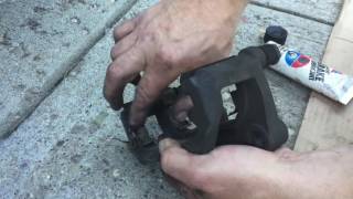 Changing the Front Brake Pads and Rotors on a Nissan Altima [upl. by Rozele920]