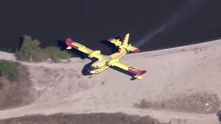 Incredible low flying fire fighter pilot battling California wildfire [upl. by Ahsrop]