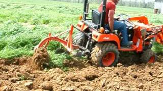 Kubota BX2200 Plowing the garden [upl. by Greiner467]