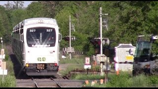 GO TRAIN STOPS A GO BUS AT A CROSSING [upl. by Eelytsirk47]