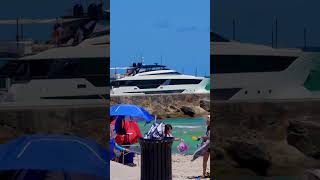 10M Ferretti Yacht passing the Haulover Inlet jetty and beach in Bal Harbour Florida [upl. by Ical]