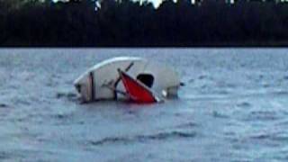 Demonstrating how to right a capsized Sunfish Sailboat [upl. by Bengt]