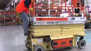 Scissor Aerial Lift Training JLG ES [upl. by Aldas]