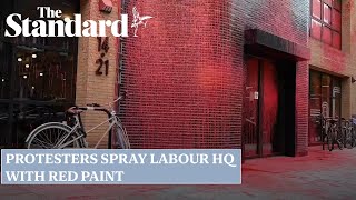 Protesters demanding arms embargo on Israel spray Labour HQ with red paint [upl. by Let]