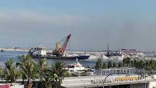 Manila Bay Reclamation project viewed from Lanson Place MOA complex [upl. by Plafker441]