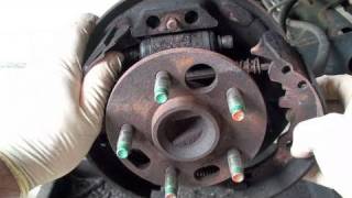 How To Replace Drum Brake Shoes Full  EricTheCarGuy [upl. by Inaluahek]