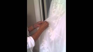 How an over or under bustle works on a bridal ballgown [upl. by Ahsak]