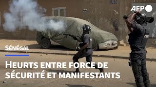 Sénégal  affrontements entre manifestants et forces de sécurité à Dakar  AFP Images [upl. by Kelcey]