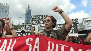 Philippines Demonstrators rally against constitutional reform on revolution anniversary  AFP [upl. by Balch546]