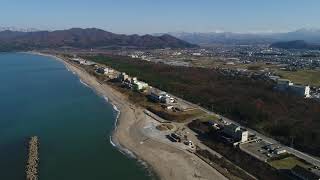 空から望む瀬波温泉街 Aerial view of Senami Onsen Hot spring resort Murakami City Japan [upl. by Atikan787]