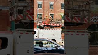 Truck fixing Electric lines for the streetcar Toronto ontario Canada [upl. by Nerro]