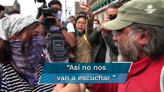 Hombre increpa a feminista durante marcha por los 43 de Ayotzinapa [upl. by Roinuj662]