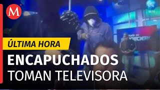 Encapuchados toman canal de televisión en Ecuador mantienen a empleados rehenes [upl. by Novyert]