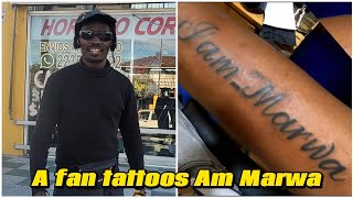 Crazy A Tanzanian Fan Tattoos Kenyan YouTuber Am Marwas Name on His Arm [upl. by Aicella453]