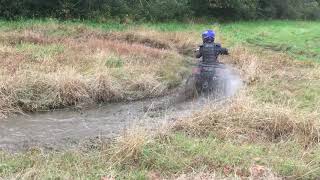 Tao Tao 110cc Utility ATV Playing In Storm Water 110417 [upl. by Nyladnek]