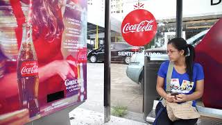 CocaCola dispenser at Panama Bus shelter for Christmas  JCDecaux Top Media Panama [upl. by Hseham]