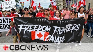 Freedom Convoy supporters protest on Canada Day [upl. by Ylrebnik]