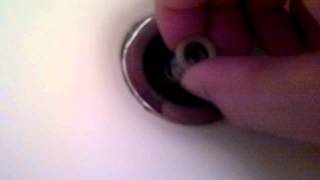 Pop up bathroom sink stopper with button  How To fix clean and assemble part 1 [upl. by Quartis]