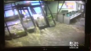 Floodwater breaks through college doors  caught on tape [upl. by Wernda]