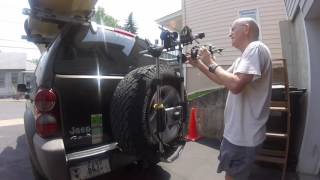 Installing Thule spare tire bike rack on Jeep KJ [upl. by Harvison]