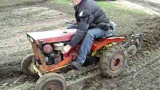 Allis Chalmers B10 Simplicity Landlord tractor plowing garden April 2011 [upl. by Fleeta]