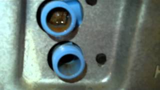 Fixing a GEHotpoint TopLoading Washer that Floods [upl. by Genesia]