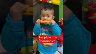 He knew how to play the harmonica baby 🇯🇵🇵🇭 musicinstruments cute [upl. by Angle]