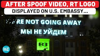 Watch RT Logo With A Snarky Message ‘Lights Up’ US Embassy In Moscow Amid Tensions Over Sanctions [upl. by Aicilev]