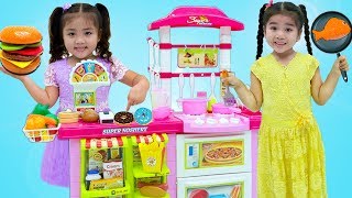 Suri and Annie Cooking Pretend Food with Toy Kitchen Play Set [upl. by Niffirg]