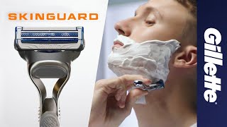 НОВАЯ Бритва Gillette SkinGuard Защити Свое Лицо от Раздражения [upl. by Kappel61]