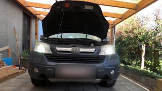 Replace Xenon HID D2S bulbs and on the parking light as well on Honda CRV 2007 [upl. by Edahsalof]