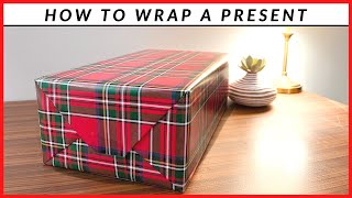 How To Wrap A Present  Simple Wrapping Paper Technique [upl. by Arakat]