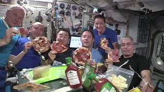 Astronauts have a pizza party in space [upl. by Eciral]