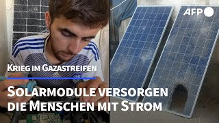 Palästinenser in Gaza setzen auf Solarstrom  und reparieren Module  AFP [upl. by Parthen]