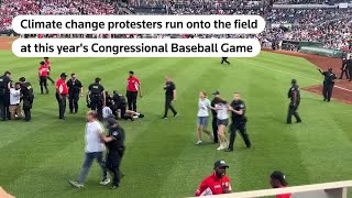 Climate protesters disrupt Congressional Baseball Game  REUTERS [upl. by Jasper]