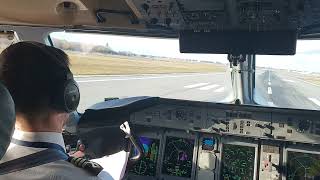 Dash 8 Q400 cockpit landing in Warsaw WAW gusty wind [upl. by Dublin]