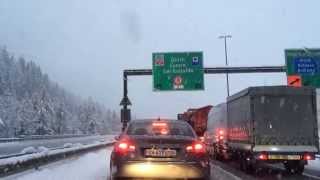 Gotthard tunnel entrance with snow falling [upl. by Ecinhoj]