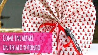 Come incartare un regalo rotondo [upl. by Lleirbag568]