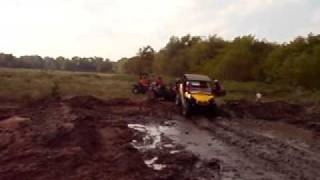 2011 CanAm Commander 1000 XT on 295 outlaws in a mud bog [upl. by Eilrahs]