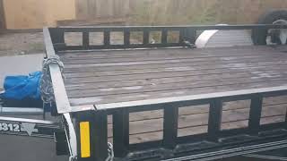 Spraying used motor oildiesel fuel to protect trailer deck [upl. by Berry513]