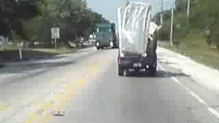 Mattress Falls off Pickup Truck [upl. by Pooi]