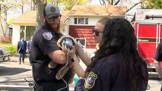 Galloway Twp EMTs give oxygen to a dog rescued from a house fire by firefighters [upl. by Ettennahs]